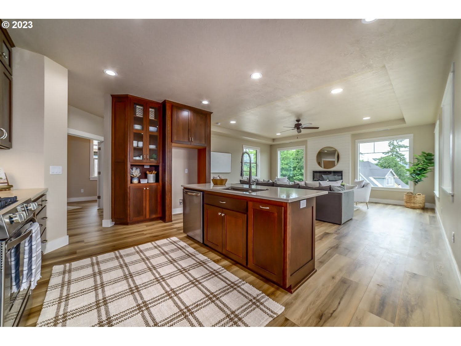 361 Mountaingate Drive Springfield, OR 97478 - Photo 15 of 35 a open kitchen with stainless steel appliances kitchen island granite countertop a refrigerator and a stove
