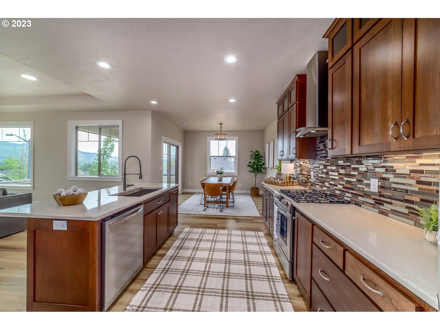 361 Mountaingate Drive Springfield, OR 97478 - Photo 16 of 35 a kitchen with sink stove and cabinets