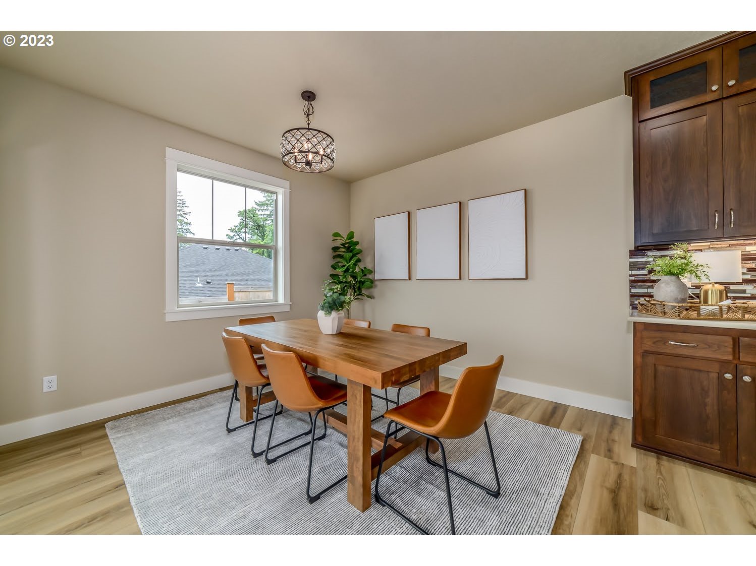 361 Mountaingate Drive Springfield, OR 97478 - Photo 17 of 35 a view of a dining room with furniture window and wooden floor