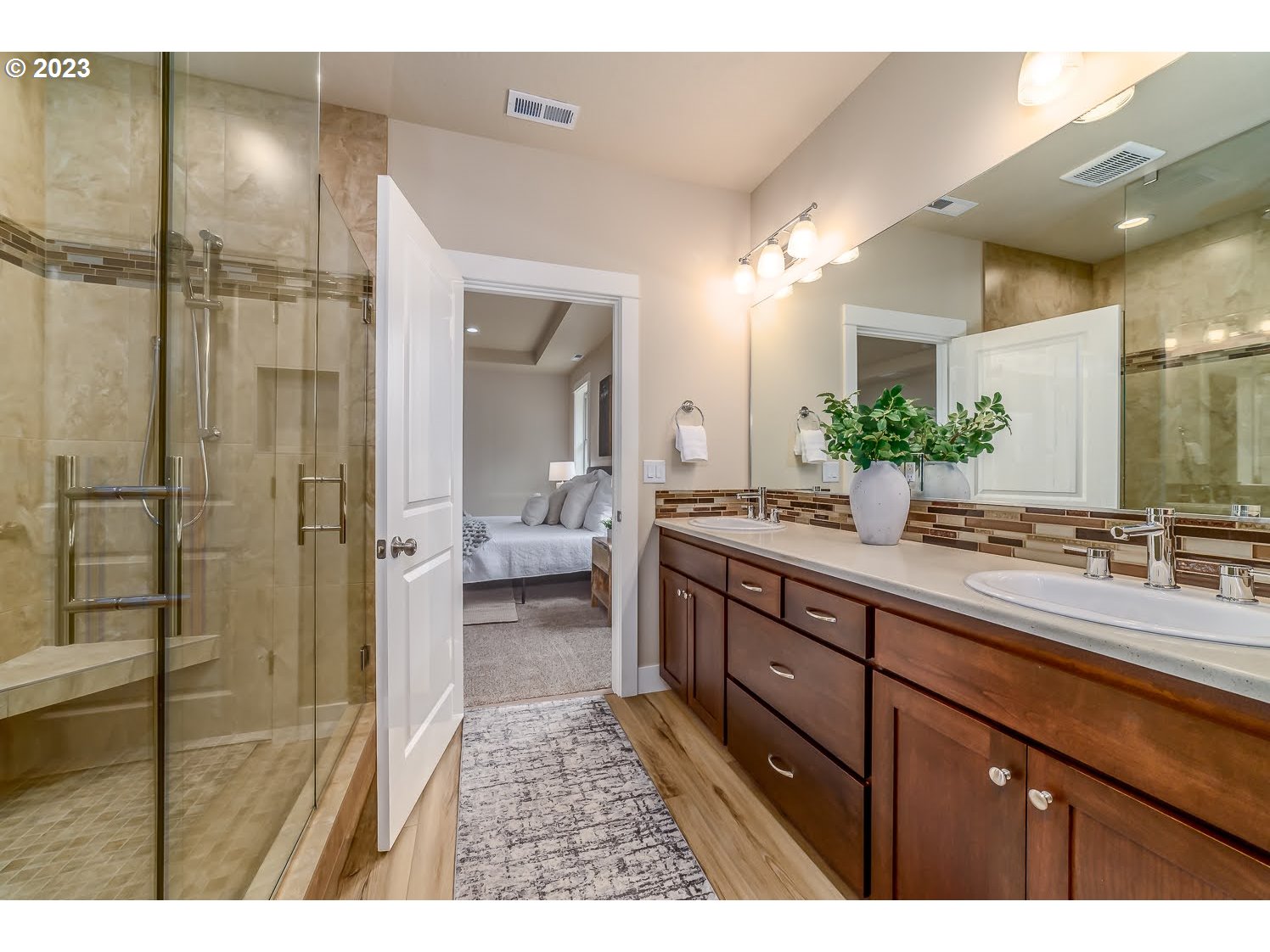 361 Mountaingate Drive Springfield, OR 97478 - Photo 23 of 35 a bathroom with a double vanity sink mirror and shower