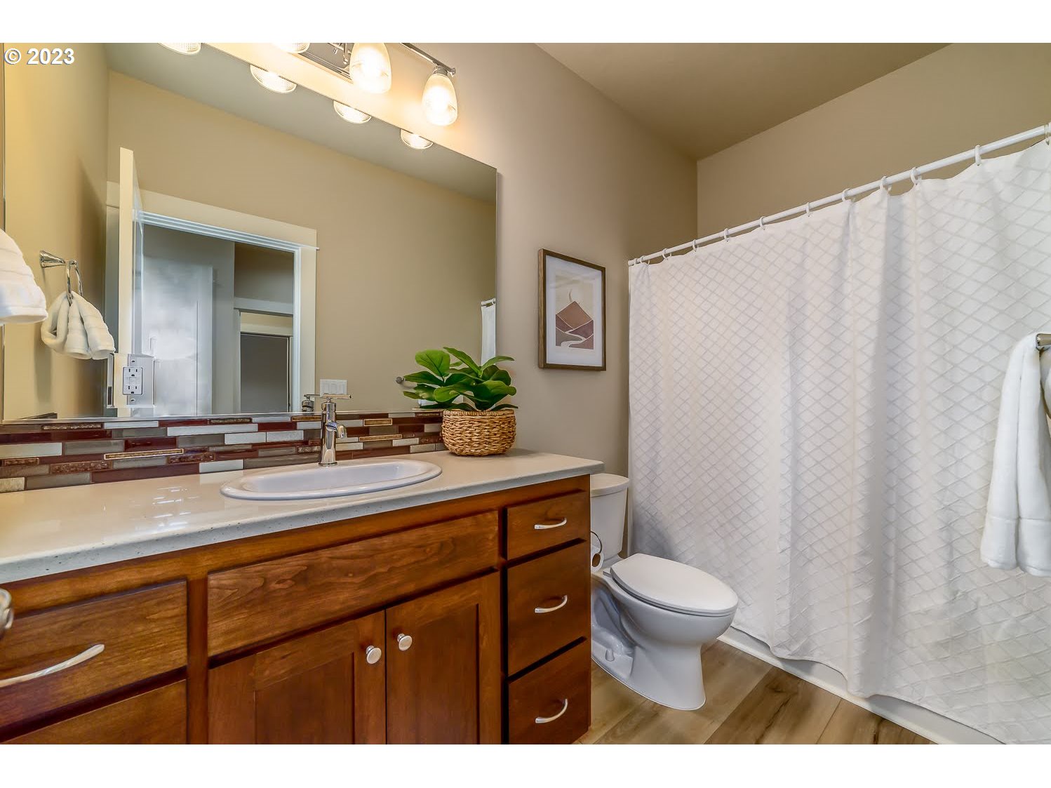 361 Mountaingate Drive Springfield, OR 97478 - Photo 27 of 35 a bathroom with a sink a toilet and a mirror