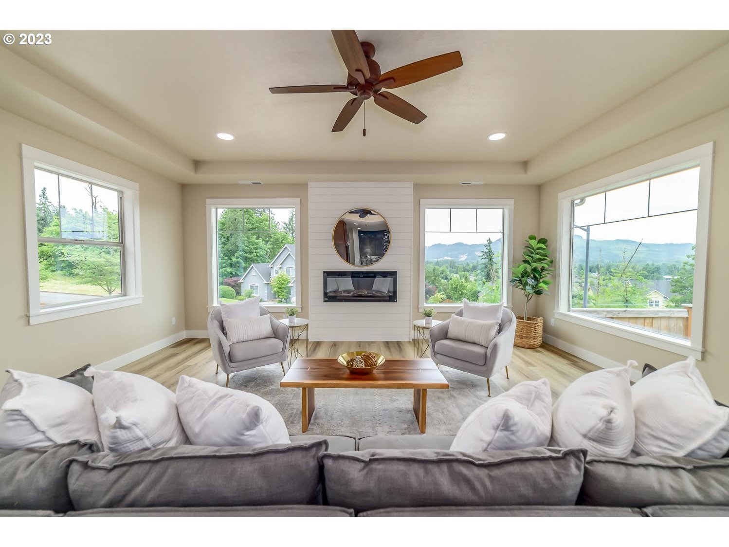 361 Mountaingate Drive Springfield, OR 97478 - Photo 9 of 35 a living room with furniture and a large window