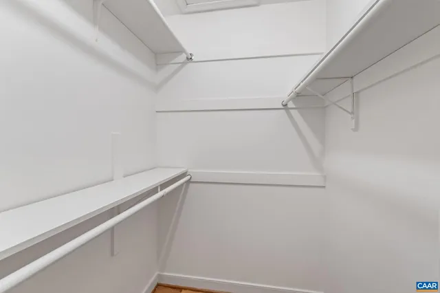 a view of a room with racks on the wall