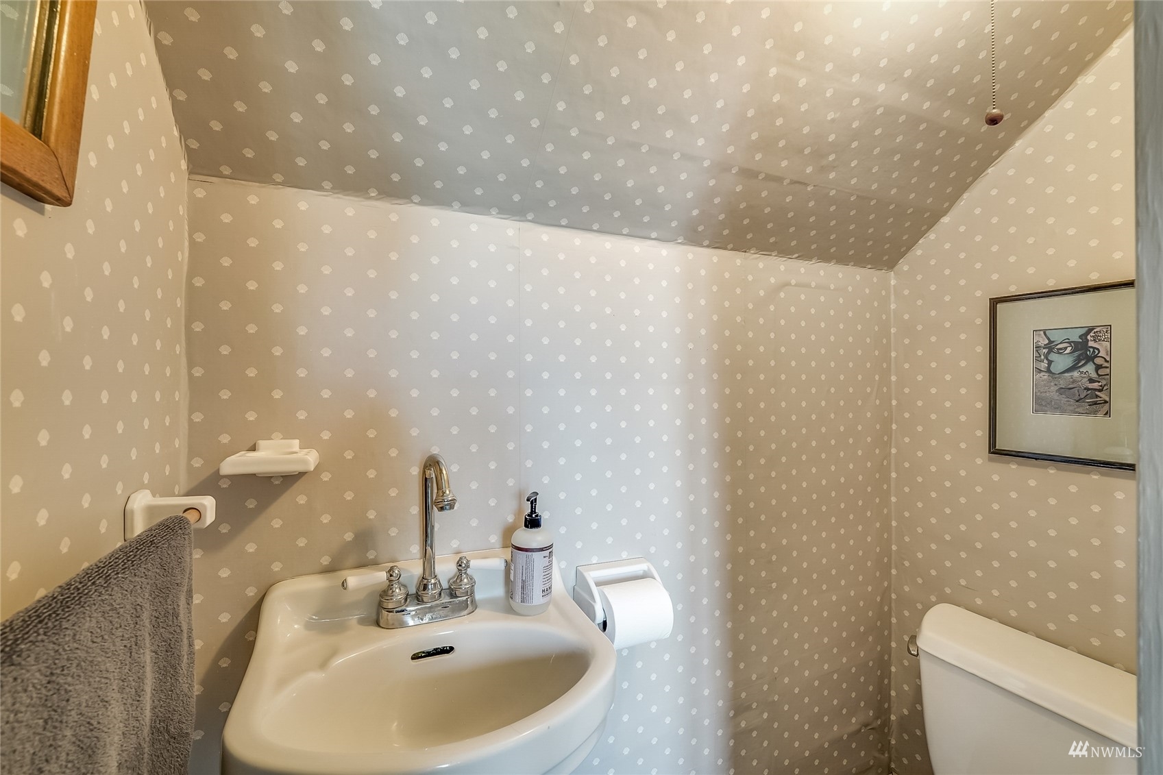 15816 Polson Road Mount Vernon, WA 98273 - Photo 22 of 40 a bathroom with a sink a toilet and mirror