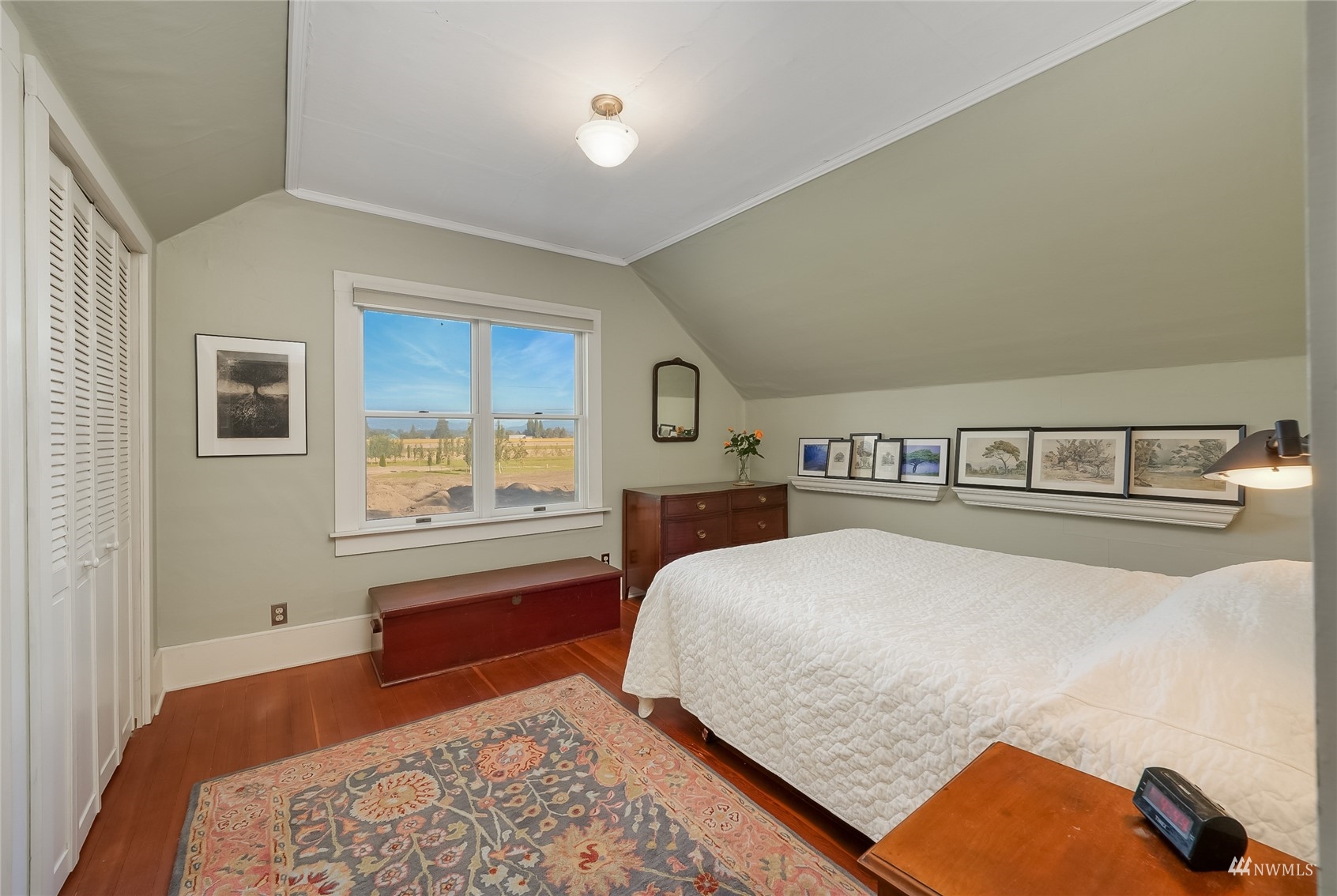 15816 Polson Road Mount Vernon, WA 98273 - Photo 23 of 40 a bedroom with a large bed and a window