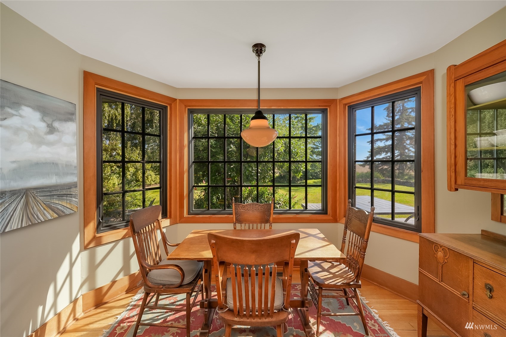 15816 Polson Road Mount Vernon, WA 98273 - Photo 5 of 40 a dining room with furniture a chandelier and glass door
