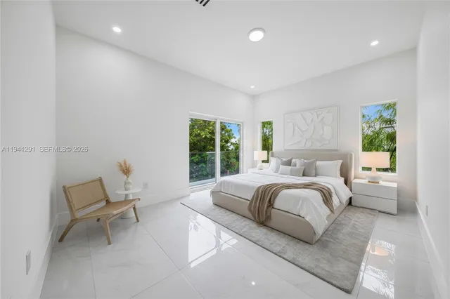 a bathroom with a sink double vanity and a mirror