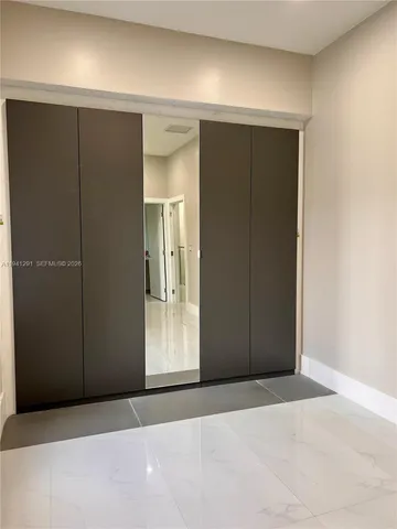 a view of outdoor space with wooden fence