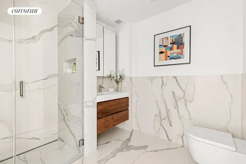a bathroom with a shower and a toilet