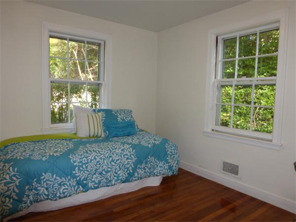 58 Ronald Road Arlington, MA 02474 - Photo 12 of 18 a view of empty room with wooden floor and fan