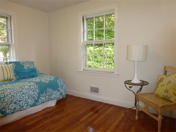 58 Ronald Road Arlington, MA 02474 - Photo 13 of 18 a bedroom with a bed and a window