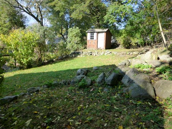 58 Ronald Road Arlington, MA 02474 - Photo 17 of 18 a view of a house with a yard