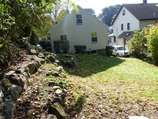 58 Ronald Road Arlington, MA 02474 - Photo 18 of 18 a view of a house with a yard