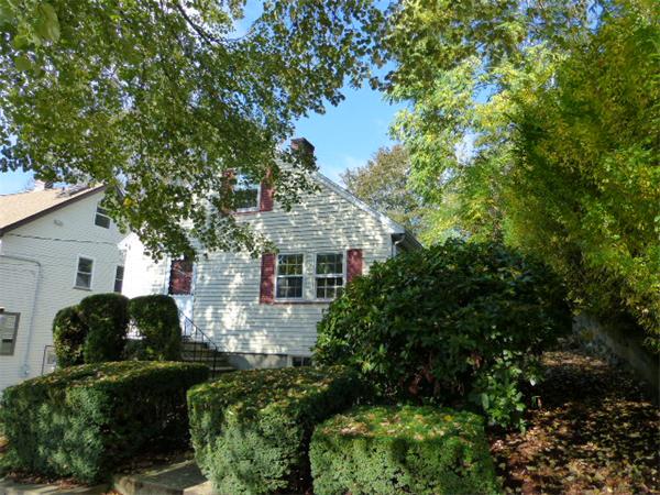 58 Ronald Road Arlington, MA 02474 - Photo 2 of 18 a front view of a house with garden