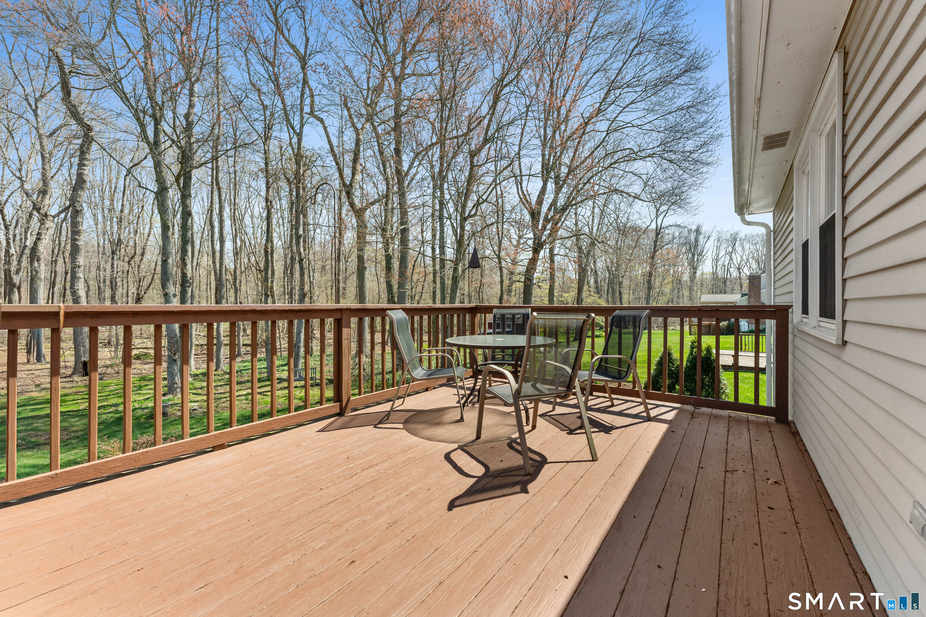 26 Seiter Hill Road Wallingford, CT 06492 - Photo 21 of 21 a view of a patio with wooden floor and outdoor seating