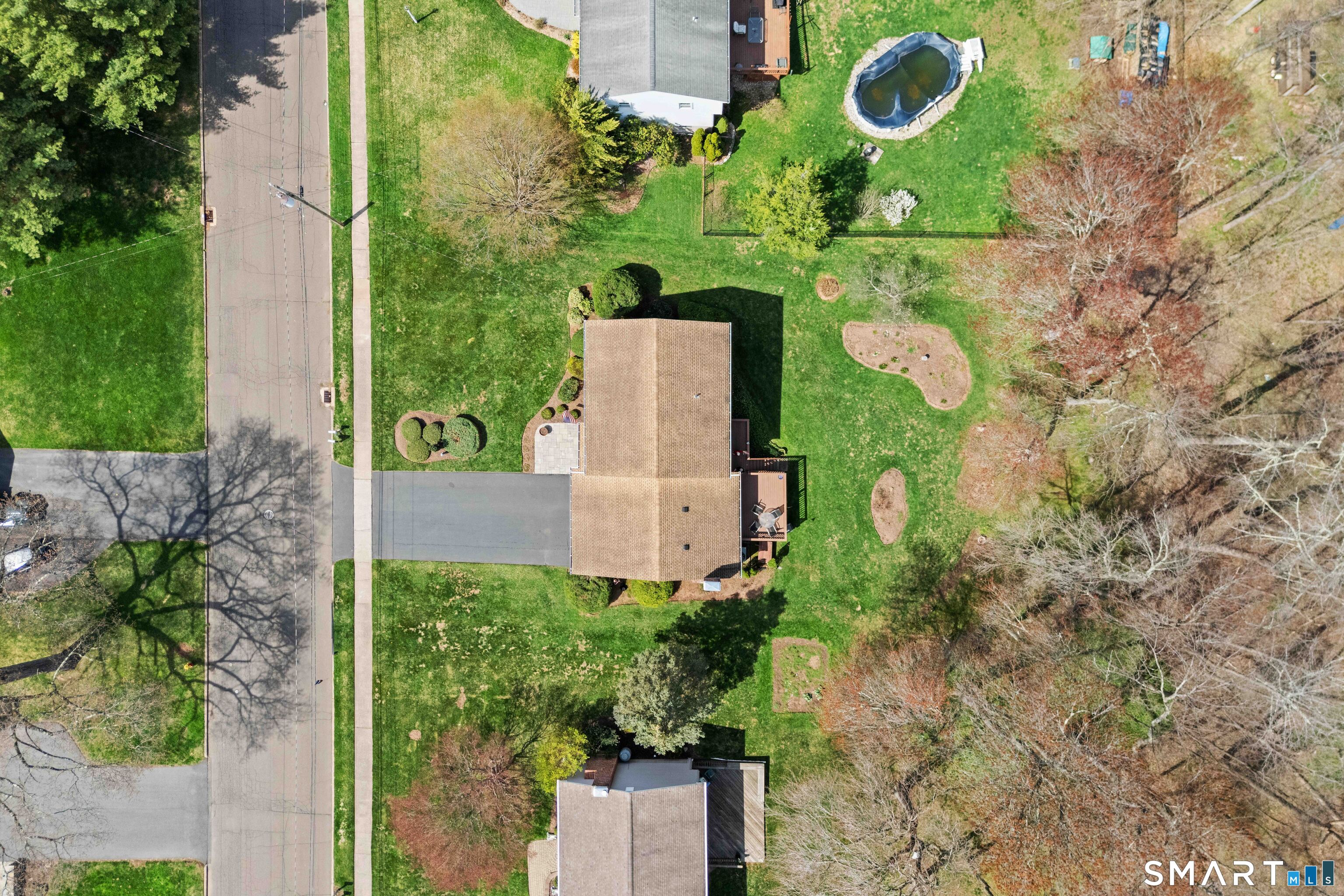 26 Seiter Hill Road Wallingford, CT 06492 - Photo 4 of 21 an aerial view of a house with a backyard and garden