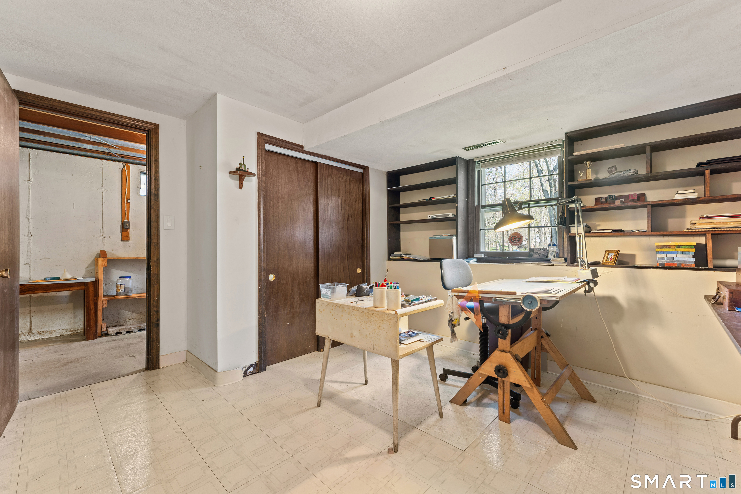 26 Seiter Hill Road Wallingford, CT 06492 - Photo 8 of 21 a workspace with furniture and window