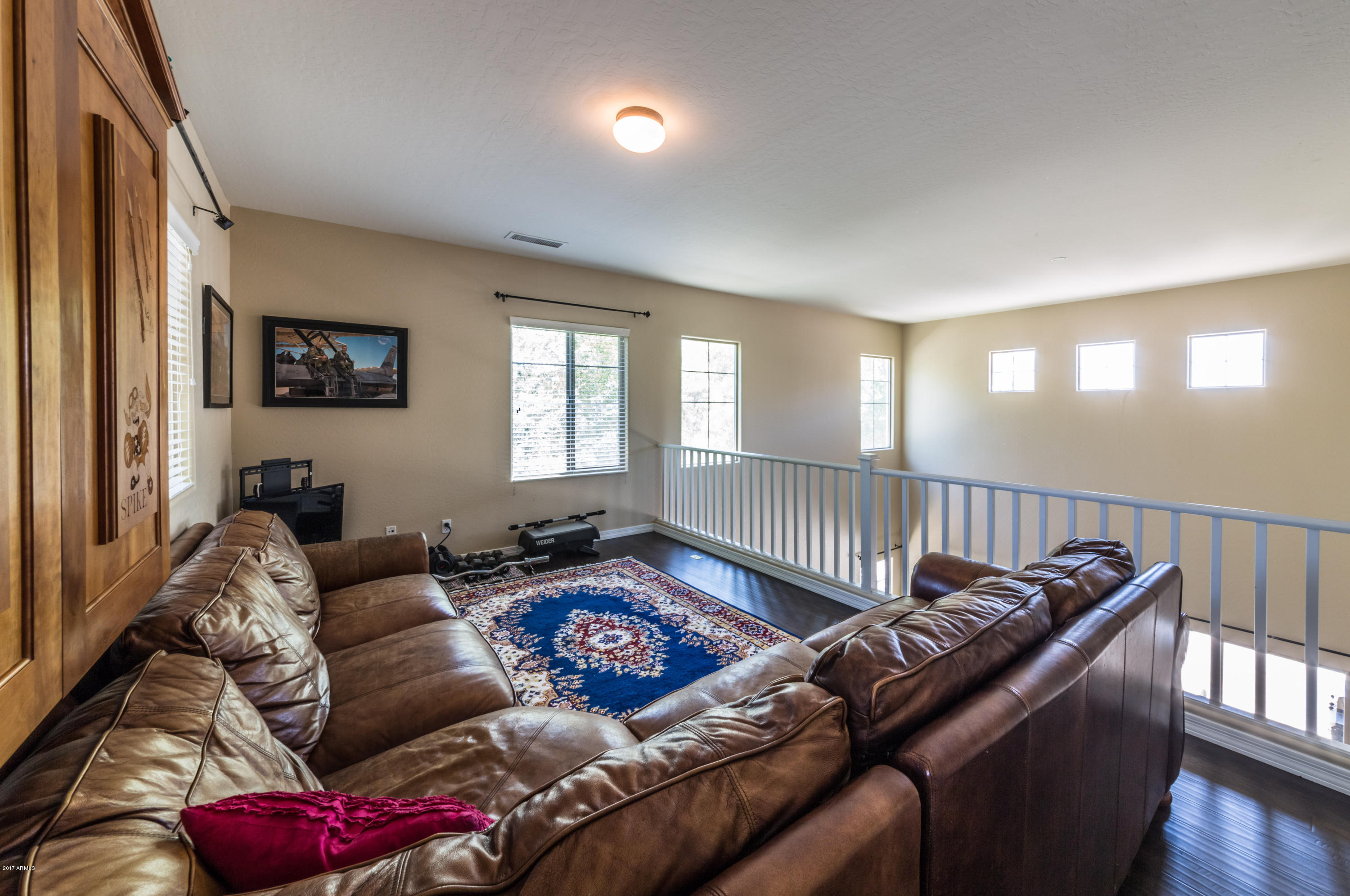 2872 North Point Ridge Road Buckeye, AZ 85396 - Photo 21 of 36 a living room with furniture