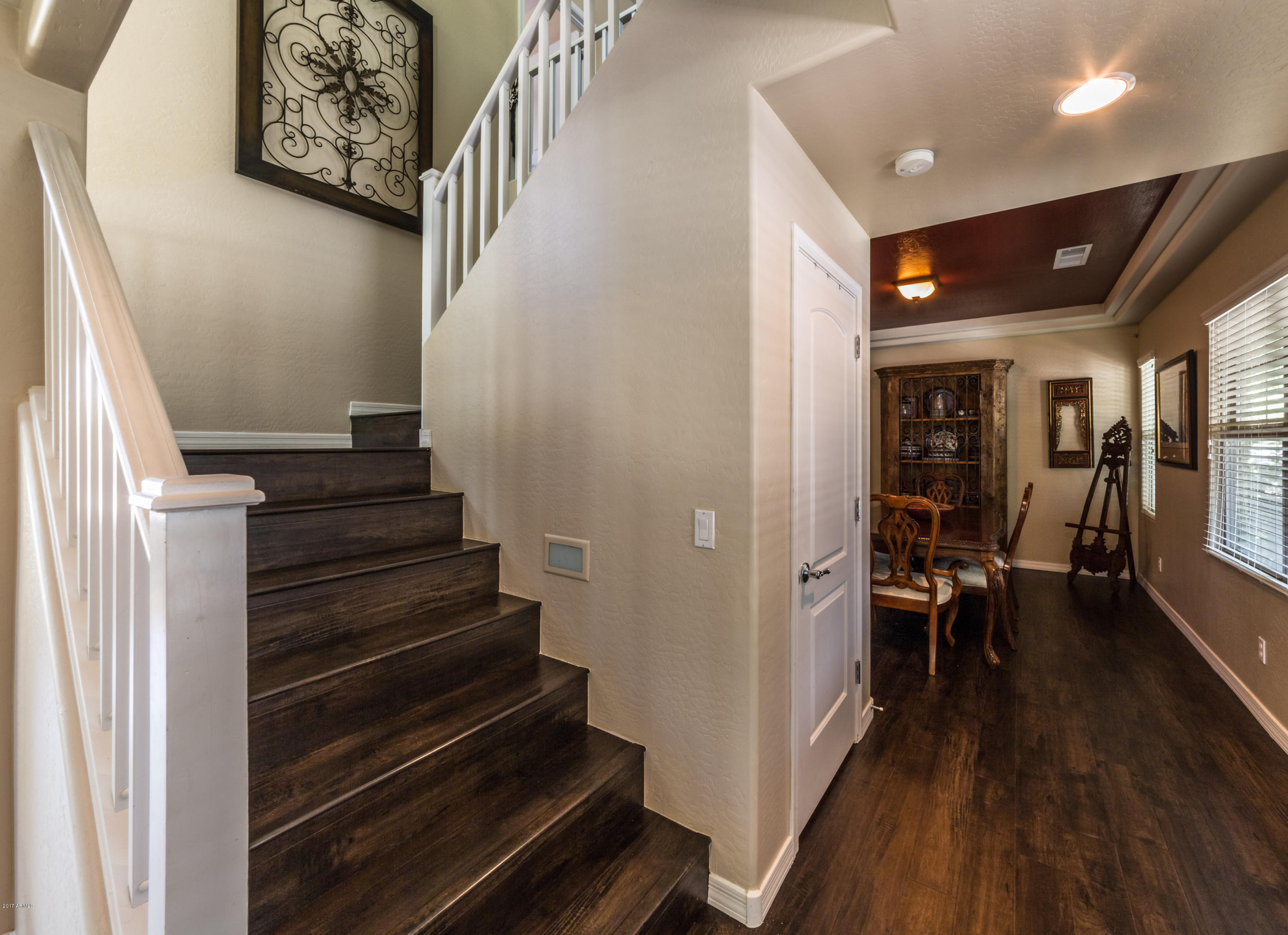 2872 North Point Ridge Road Buckeye, AZ 85396 - Photo 5 of 36 a view of entryway and hall with wooden floor
