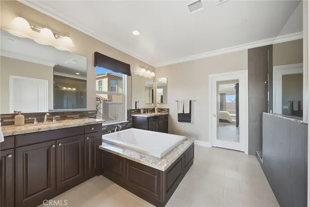 a kitchen with a stove and a refrigerator