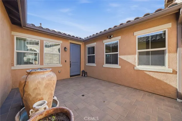 a balcony with table and chair
