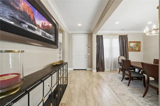 a view of a hallway with furniture