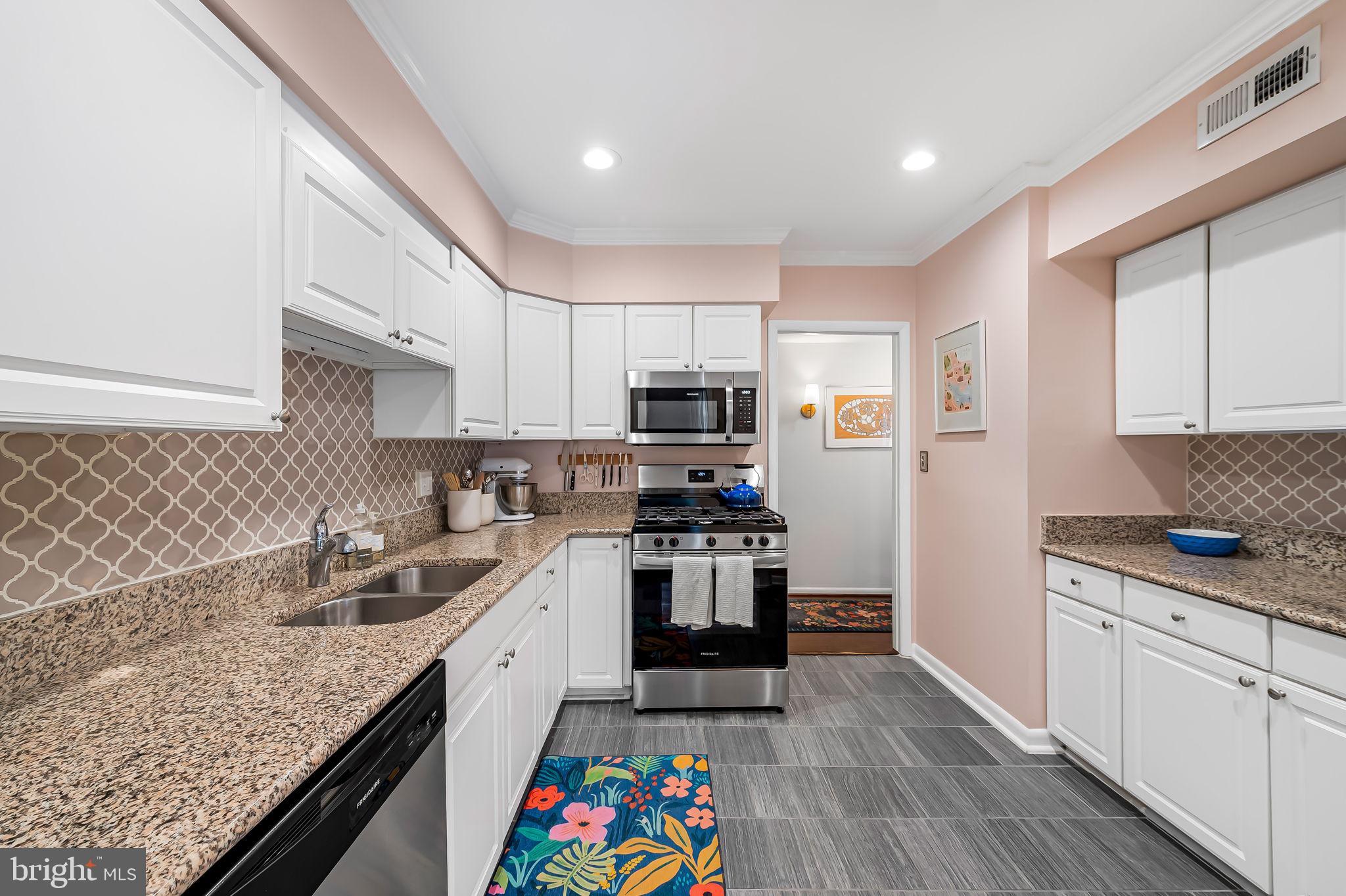 22 Cross Keys Road, Unit 22E Baltimore, MD 21210 - Photo 6 of 35 Kitchen with new appliances 12/25.