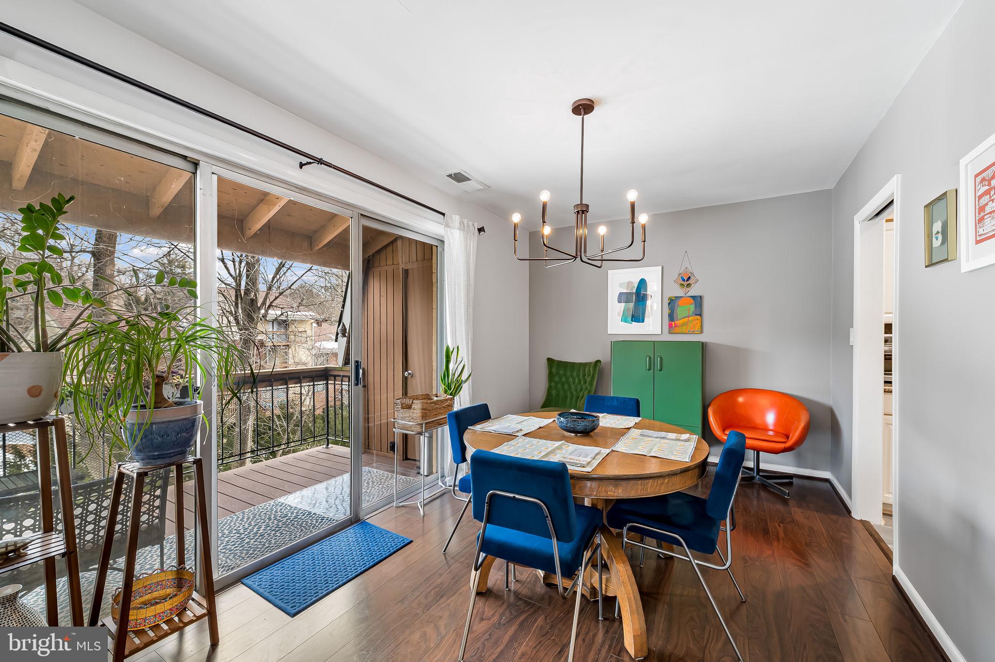 22 Cross Keys Road, Unit 22E Baltimore, MD 21210 - Photo 10 of 35 Dining room with view through the balcony