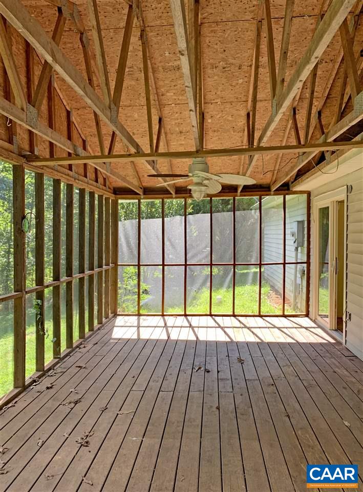 731 Geranium Road Ruckersville, VA 22968 - Photo 10 of 27 a view of porch with wooden floor and fence