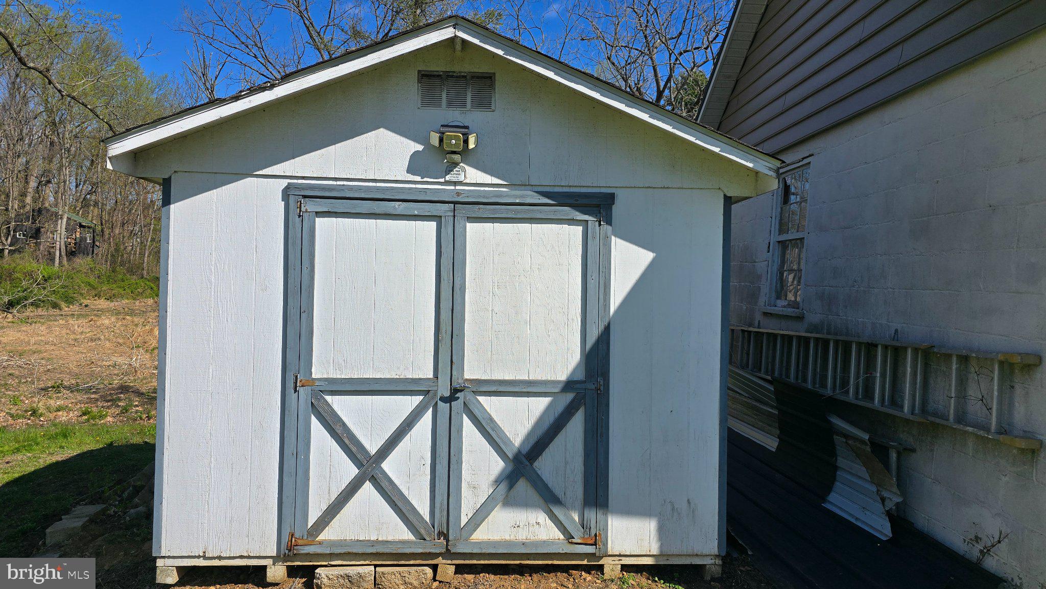 1233 New London Road Landenberg, PA 19350 - Photo 35 of 37 Charming garden shed in serene setting.