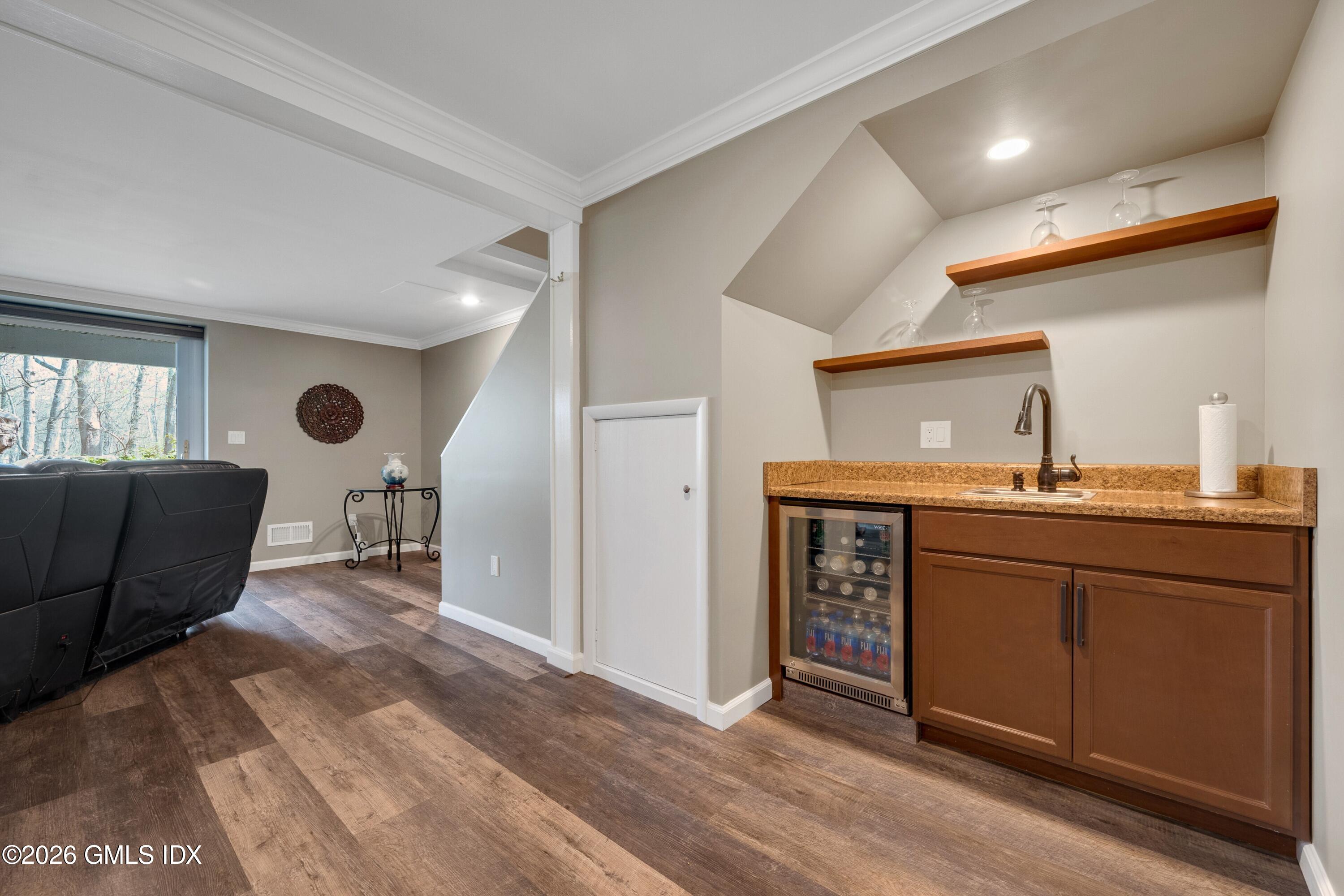 58 Stirrup Lane, Unit 58 Riverside, CT 06878 - Photo 16 of 23 a kitchen with stainless steel appliances granite countertop a refrigerator and a sink