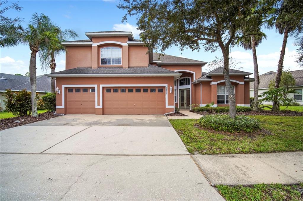 16939 Falconridge Road Lithia, FL 33547 - Photo 1 of 1 front view of a house with a yard