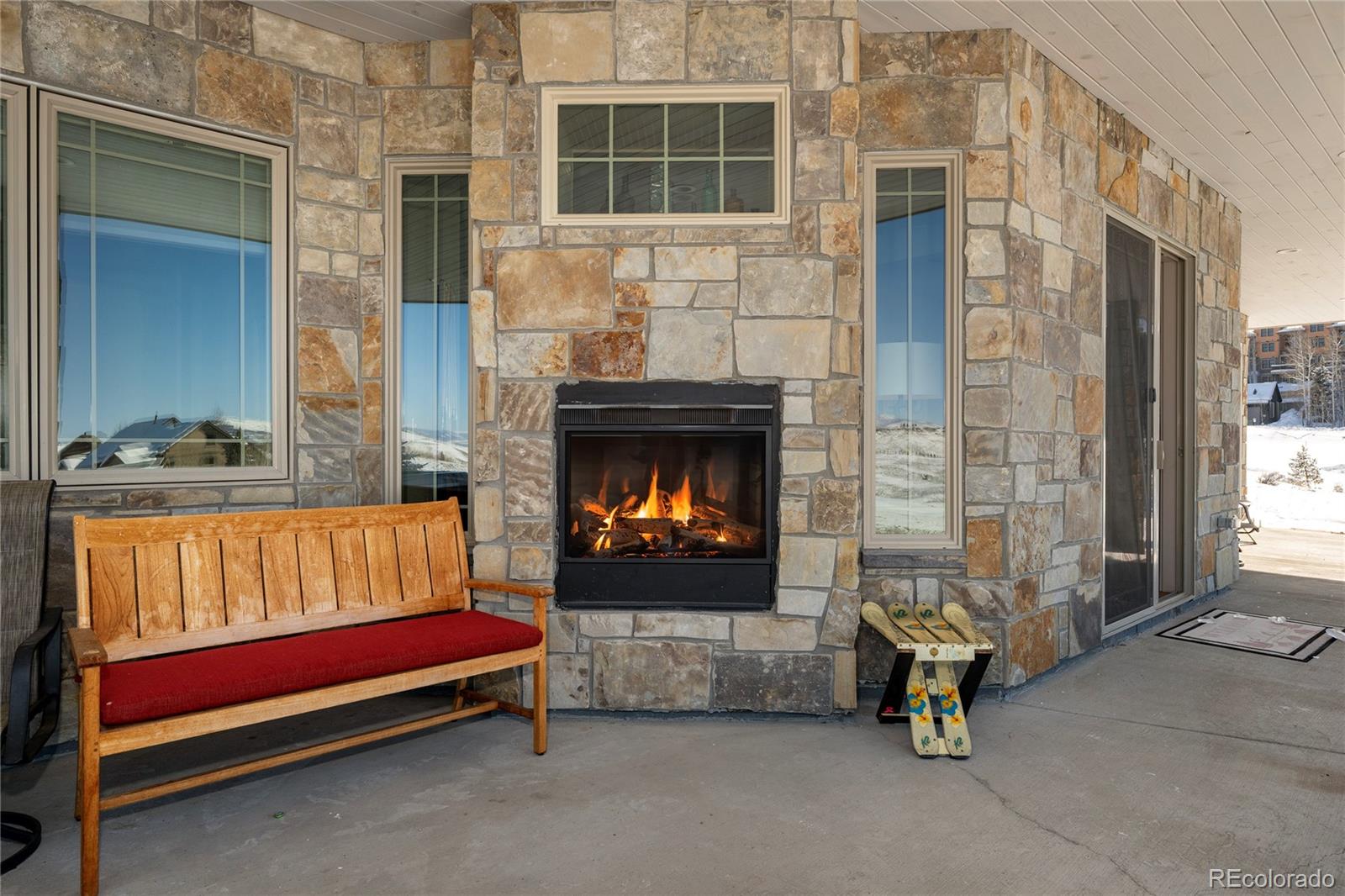 465 Lower Ranch View Drive Granby, CO 80446 - Photo 6 of 50 a outdoor living space with a couch and a fireplace
