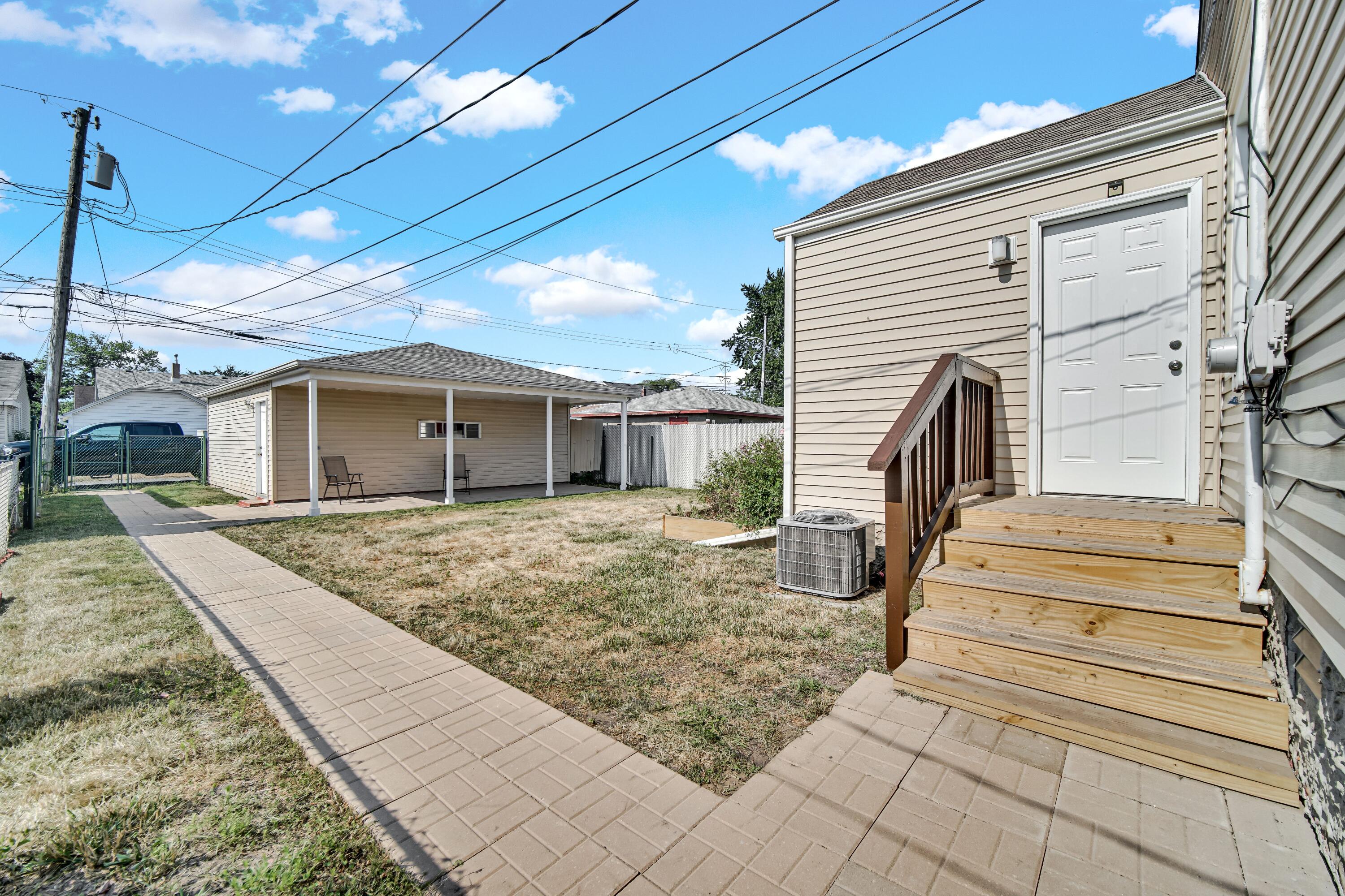 2726 162nd Place Hammond, IN 46323 - Photo 15 of 18 a front view of house with street