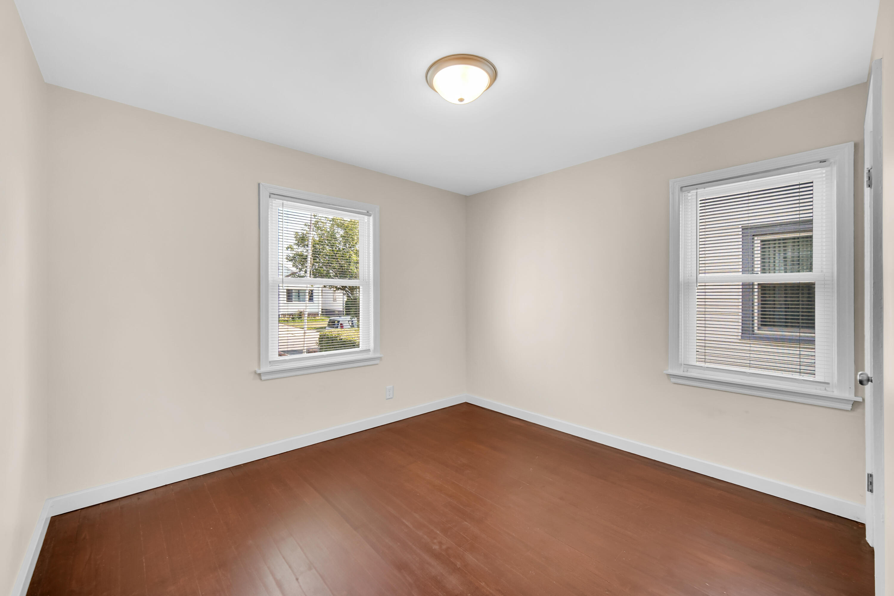 2726 162nd Place Hammond, IN 46323 - Photo 9 of 18 an empty room with a window