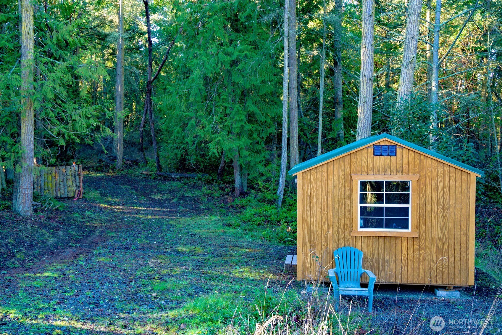 995 Kirner Road Sequim, WA 98382 - Photo 13 of 31 a view of backyard with swimming pool and wooden fence