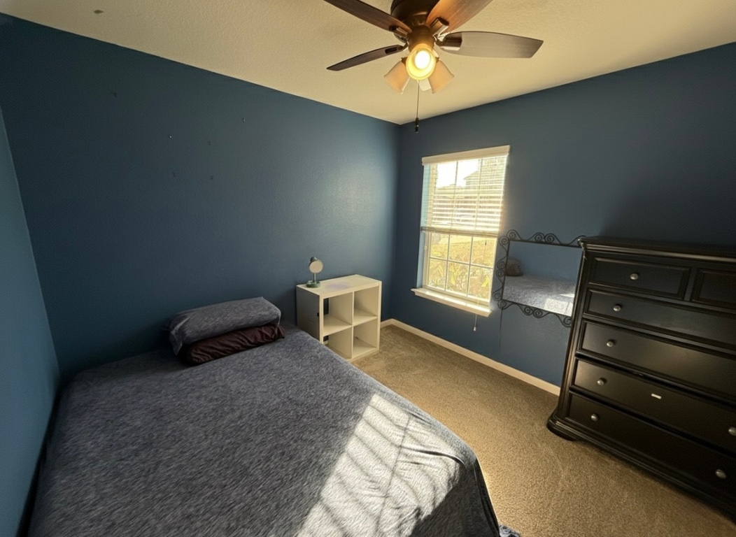 108 Koontz Loop Jarrell, TX 76537 - Photo 10 of 20 Bedroom with light carpet and ceiling fan