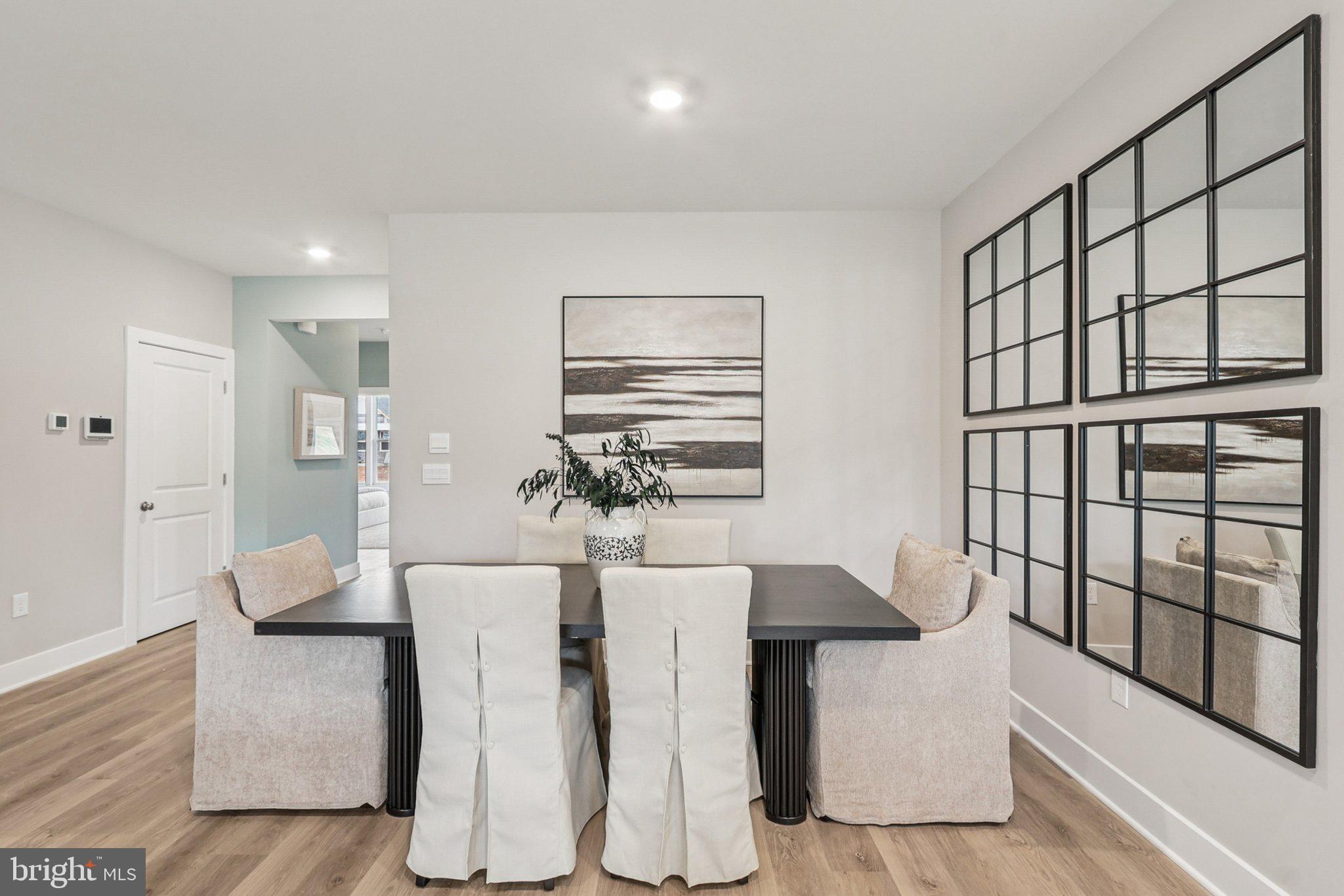 121 Hydrangea Way Winchester, VA 22602 - Photo 17 of 83 a living room with furniture a table and white walls