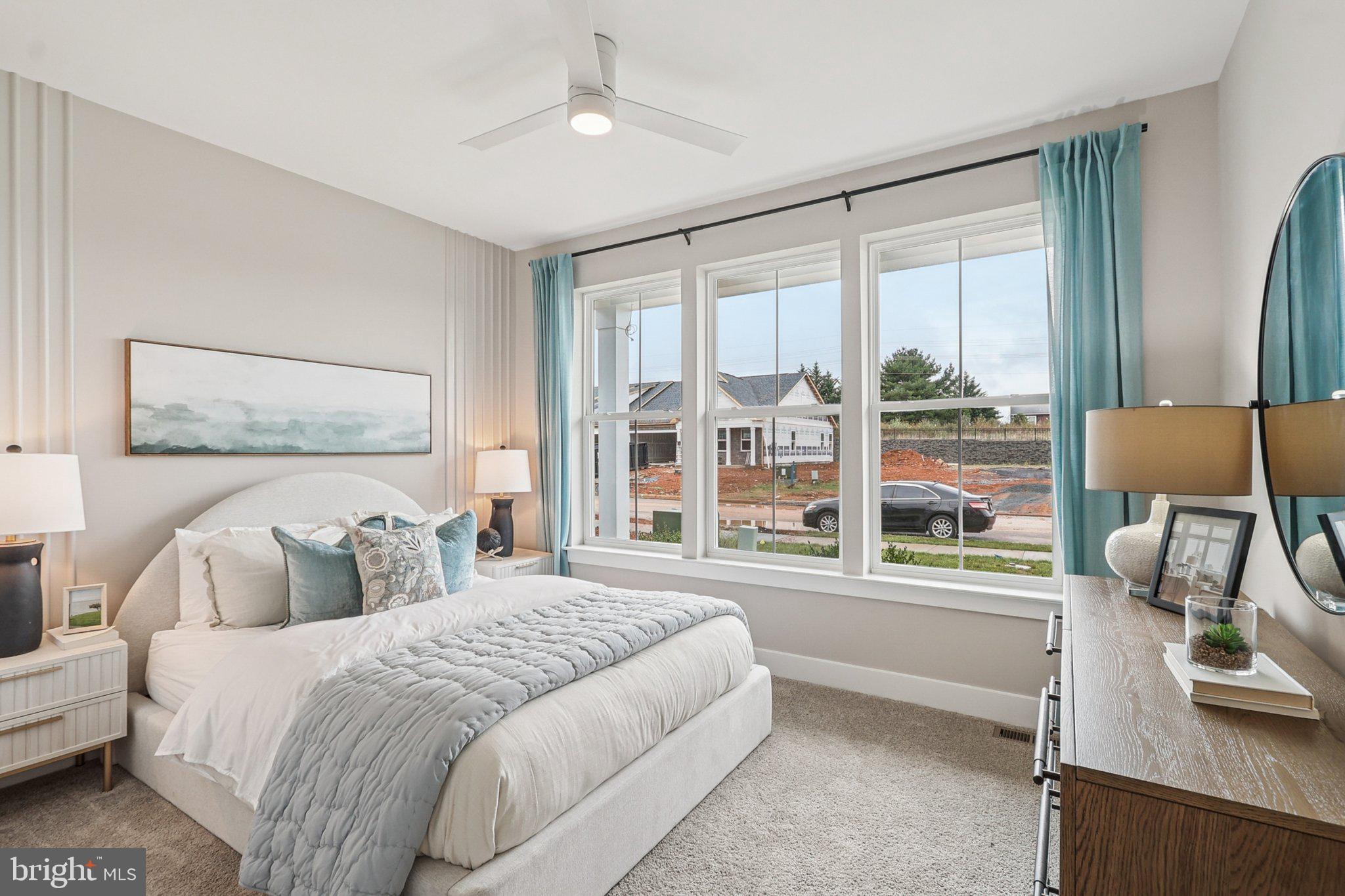 121 Hydrangea Way Winchester, VA 22602 - Photo 30 of 83 a bedroom with a bed and a large window with the outer view