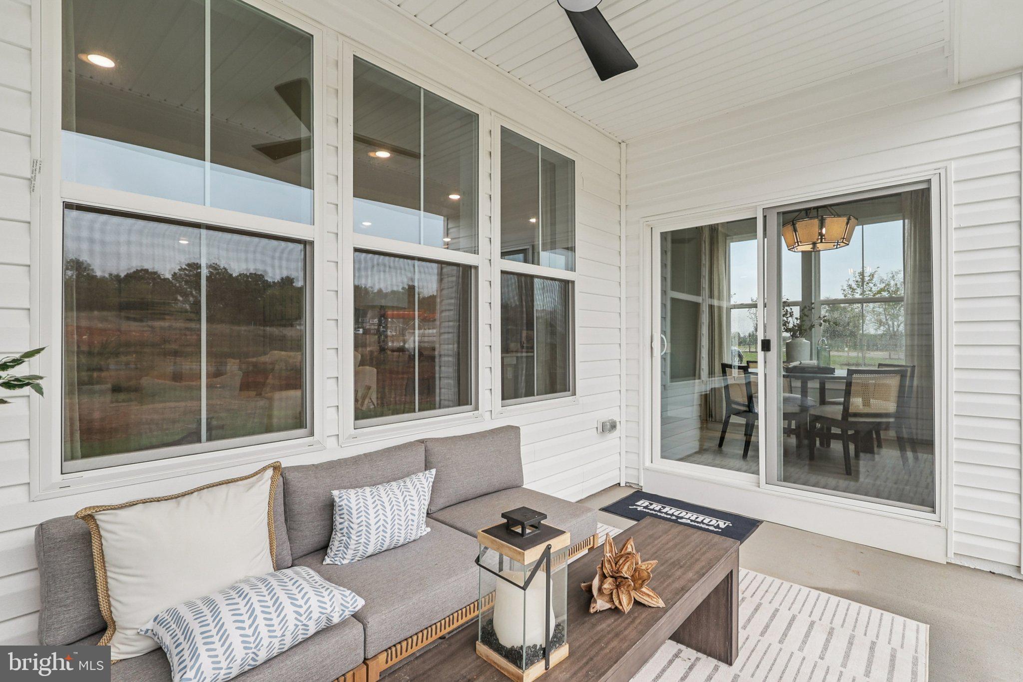 121 Hydrangea Way Winchester, VA 22602 - Photo 60 of 83 a living room with furniture and a window