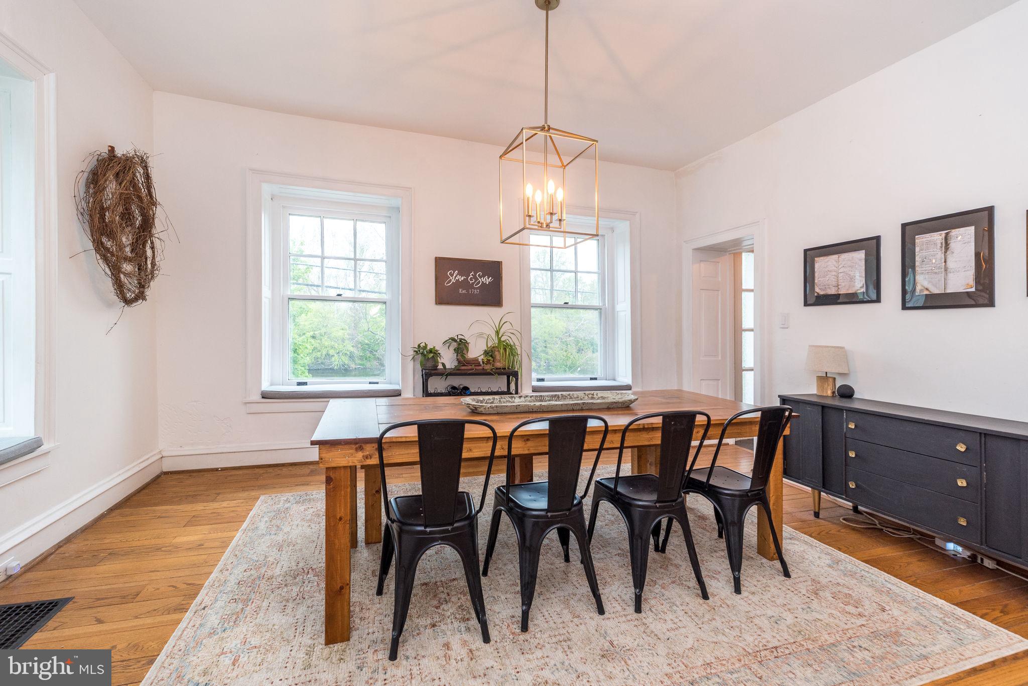 866 Schuylkill Road Birdsboro, PA 19508 - Photo 22 of 73 a view of a dining room with furniture window and wooden floor