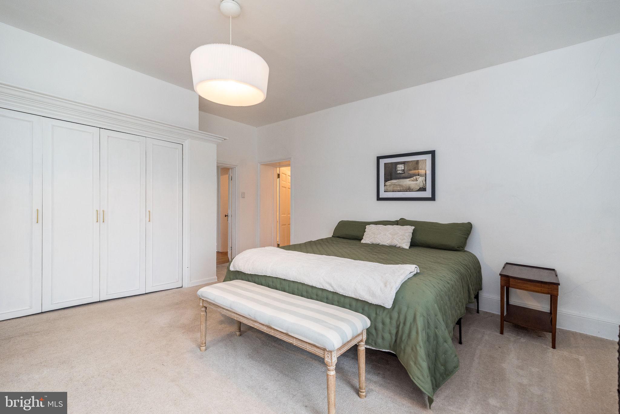 866 Schuylkill Road Birdsboro, PA 19508 - Photo 44 of 73 a bedroom with a bed and a chandelier