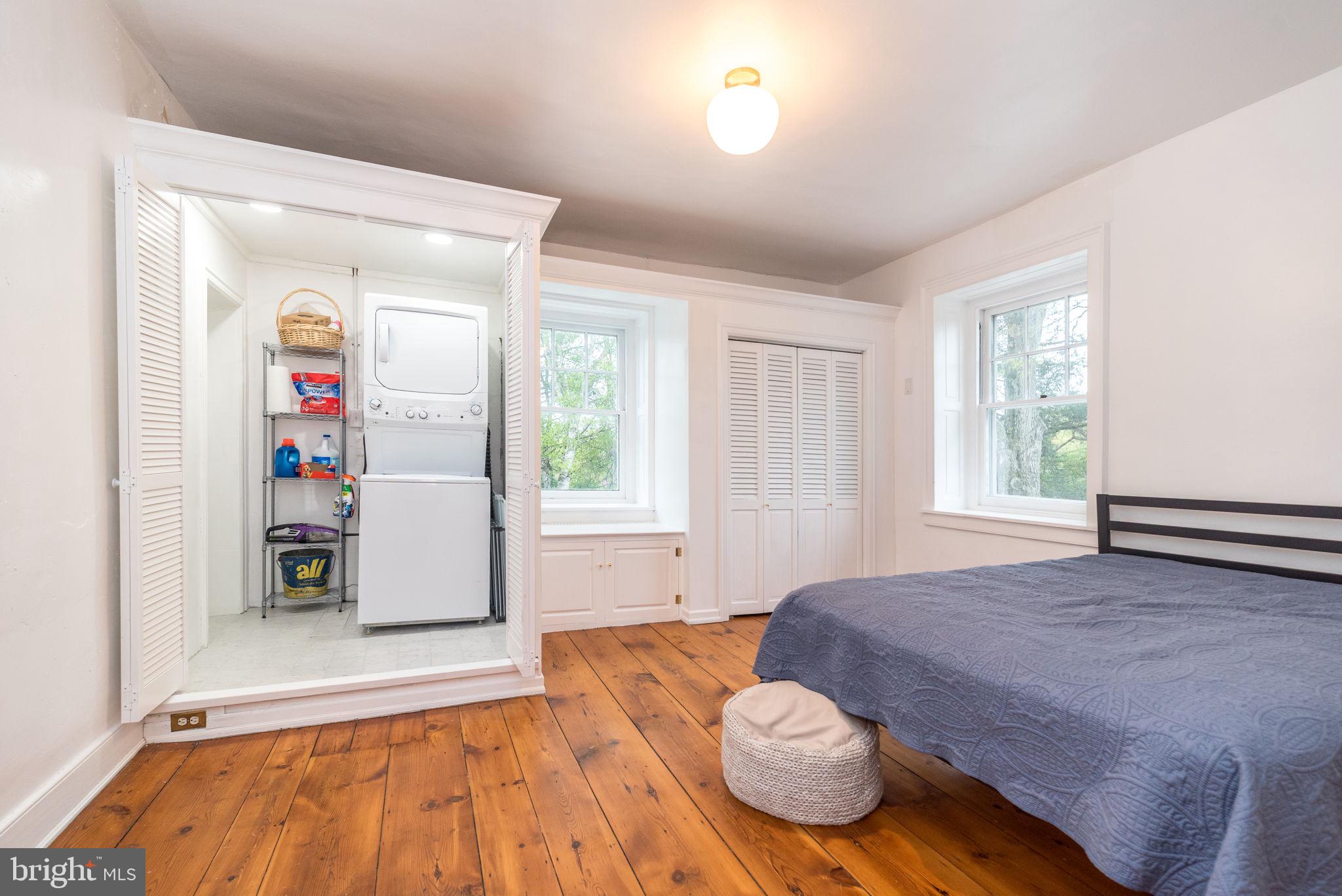 866 Schuylkill Road Birdsboro, PA 19508 - Photo 47 of 73 a view of a bedroom with a bed and wooden floor