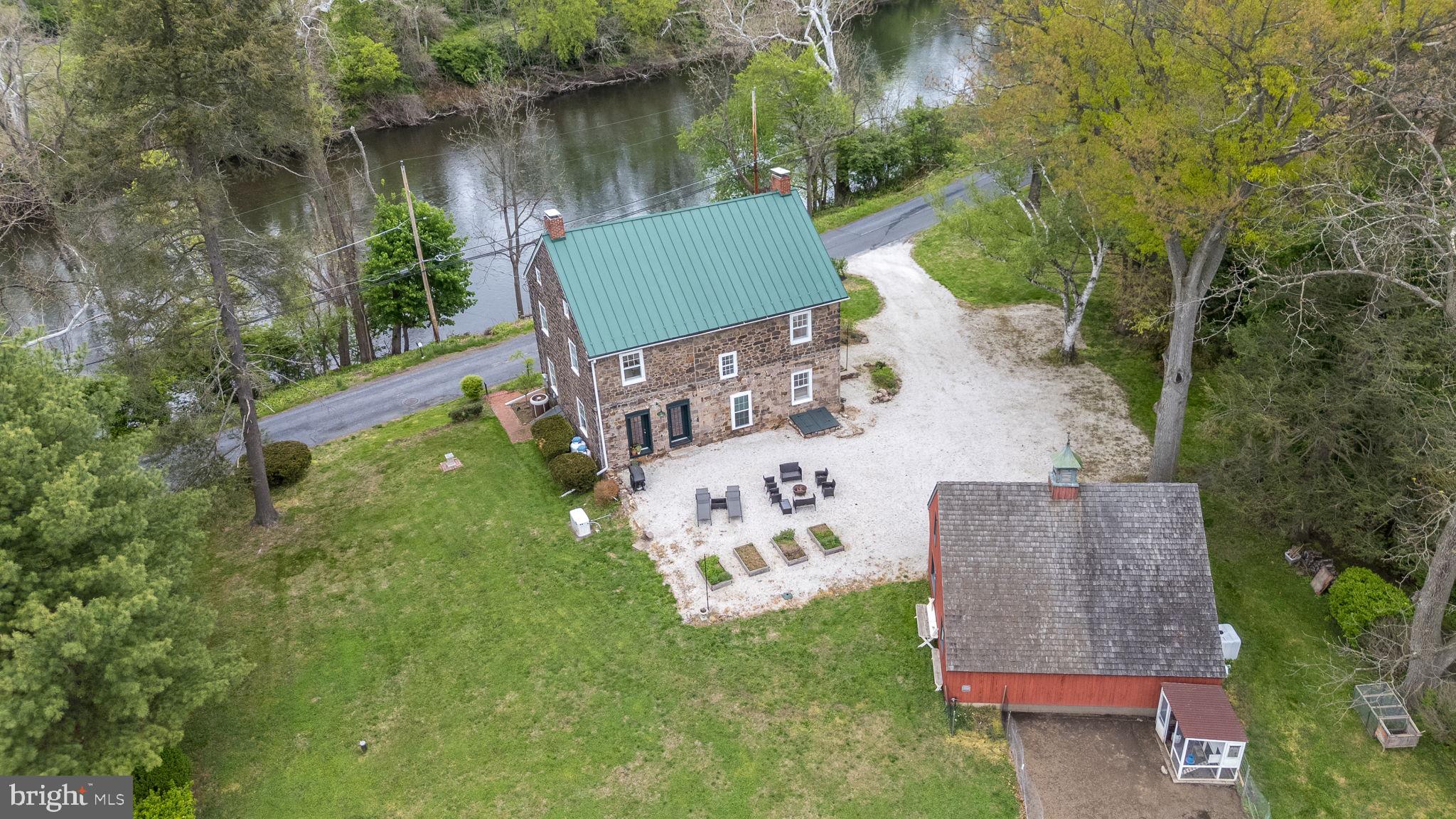 866 Schuylkill Road Birdsboro, PA 19508 - Photo 57 of 73 an aerial view of a house with garden space and lake view