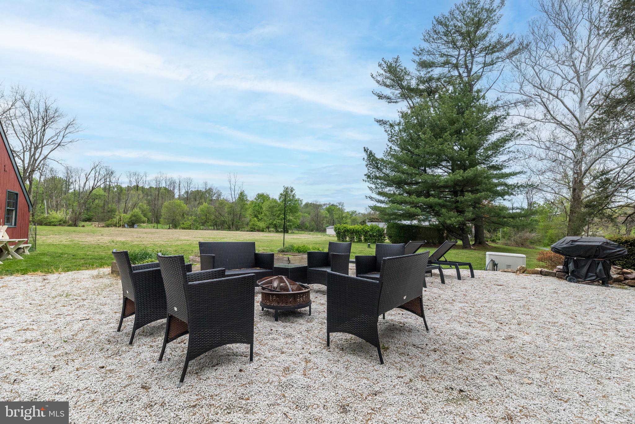 866 Schuylkill Road Birdsboro, PA 19508 - Photo 63 of 73 a view of a tables and chairs in a patio