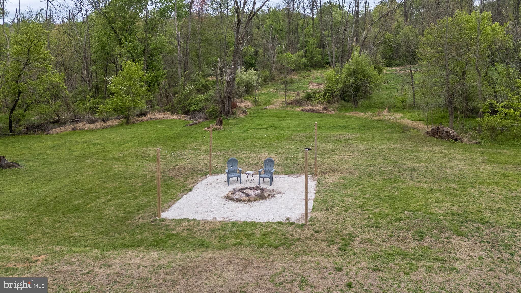 866 Schuylkill Road Birdsboro, PA 19508 - Photo 72 of 73 Tranquil fire pit retreat in nature.