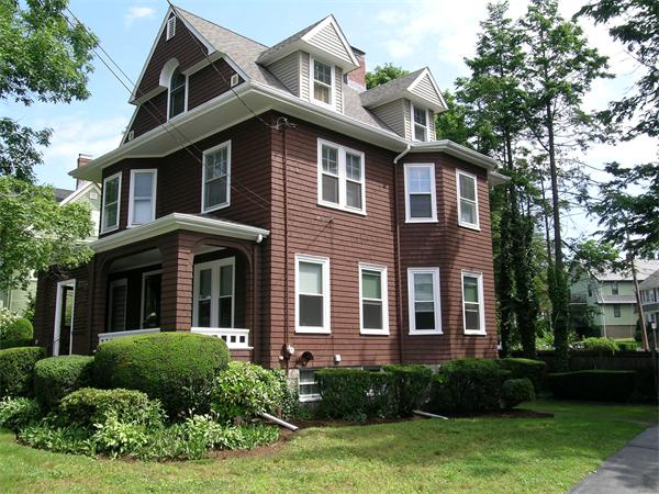 19 Marion Road Watertown, MA 02472 - Photo 1 of 20 a front view of a house with garden