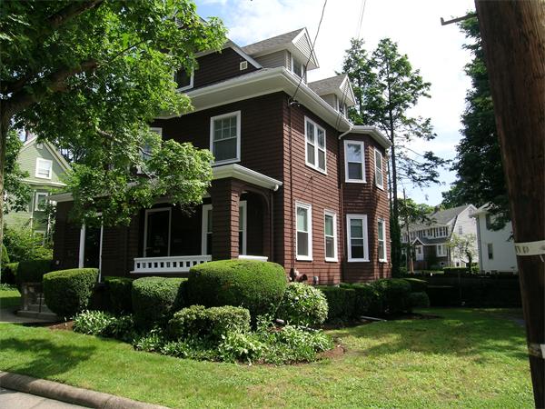 19 Marion Road Watertown, MA 02472 - Photo 19 of 20 a front view of a house with a yard and trees