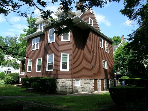 19 Marion Road Watertown, MA 02472 - Photo 20 of 20 a front view of a house with a garden