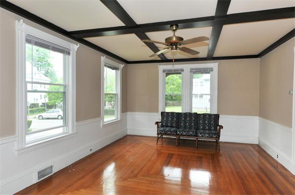 19 Marion Road Watertown, MA 02472 - Photo 2 of 20 a living room with a couch and wooden floor